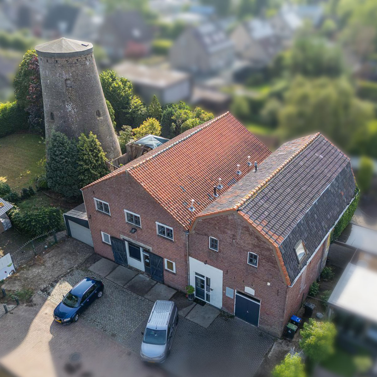 Luchtfoto van het pand van THE POWER OF BRICKS, Nolenslaan 17, Dongen